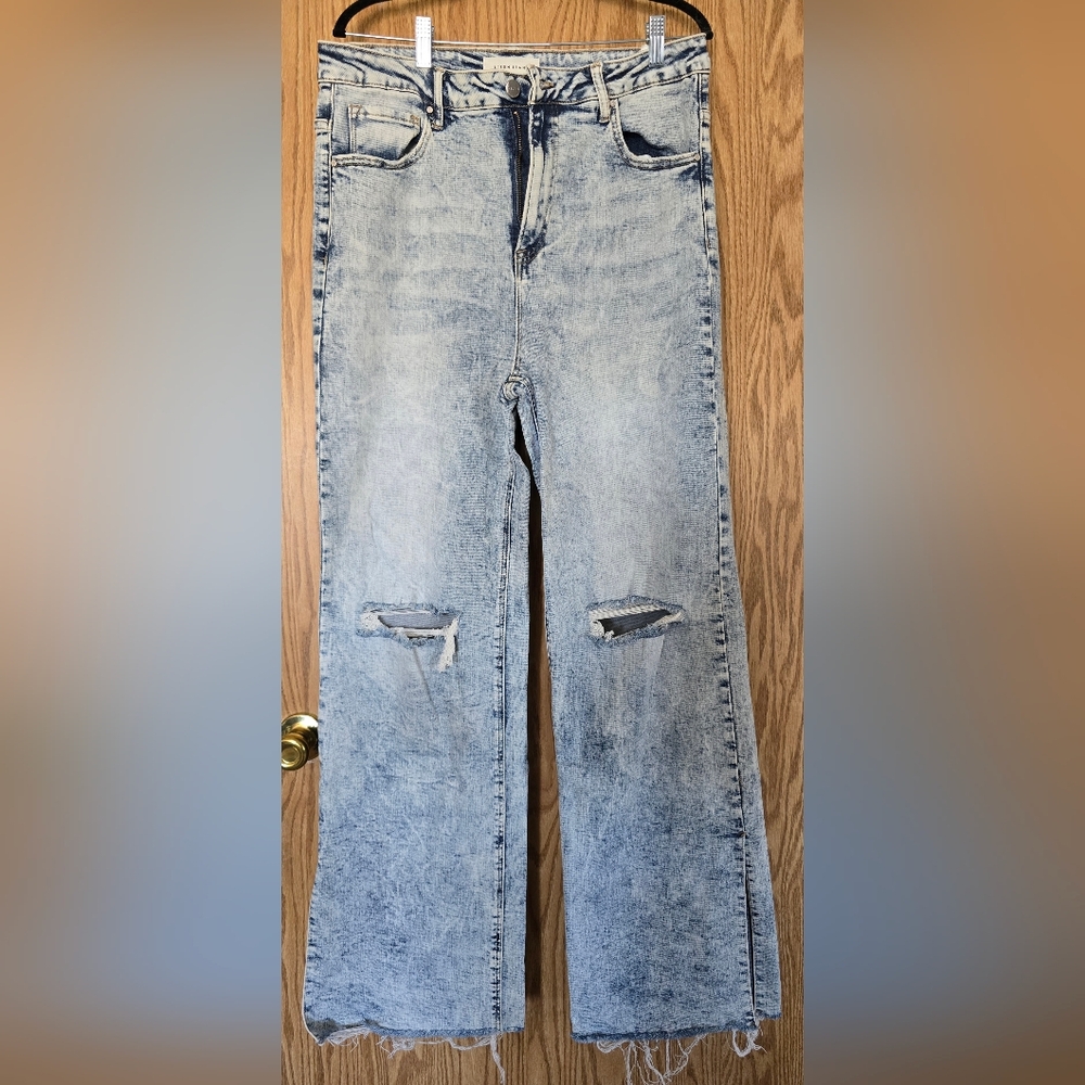 Distressed Light Blue Jeans